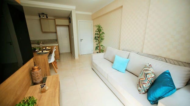Minimalist living room with Vastu-aligned furniture and natural lighting
